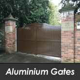 A picture of aluminium gates in dark brown powdercoat